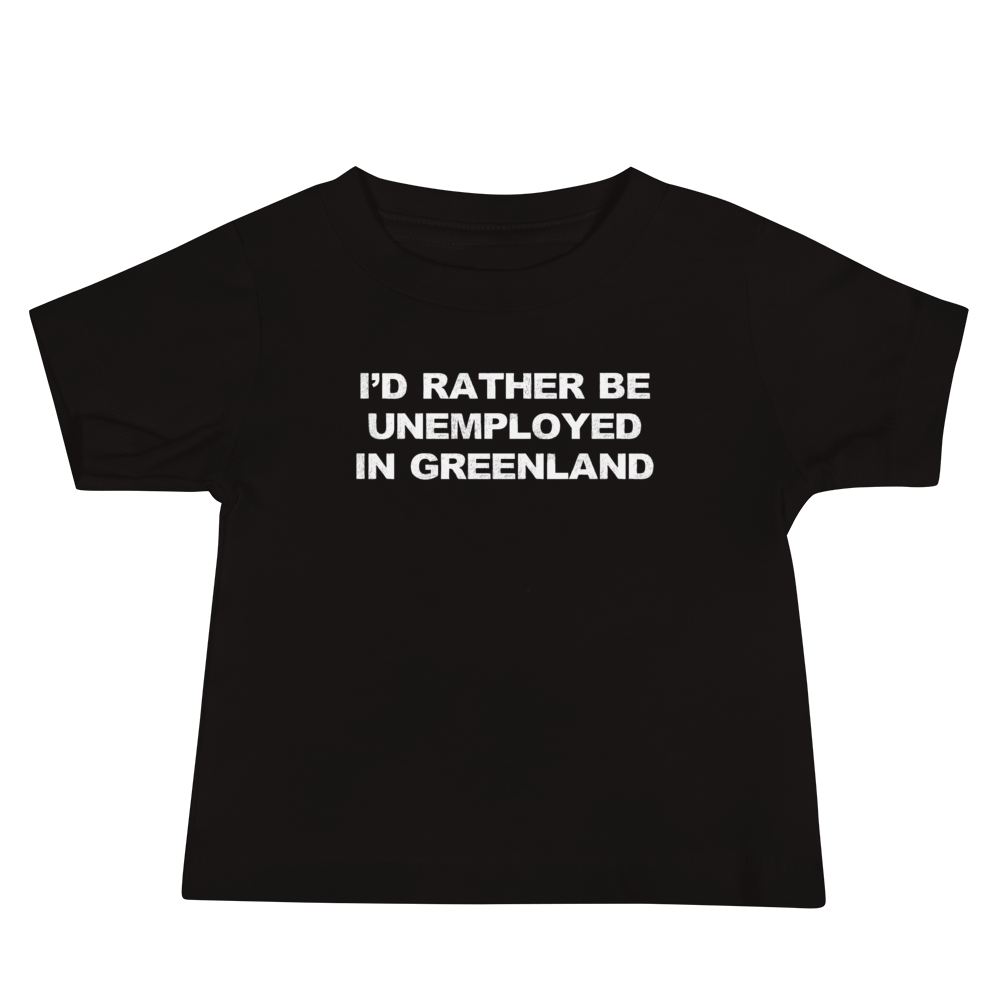 "I'd rather be unemployed in greenland" printed on a black baby jersey short sleeve tee laying on a flat surface