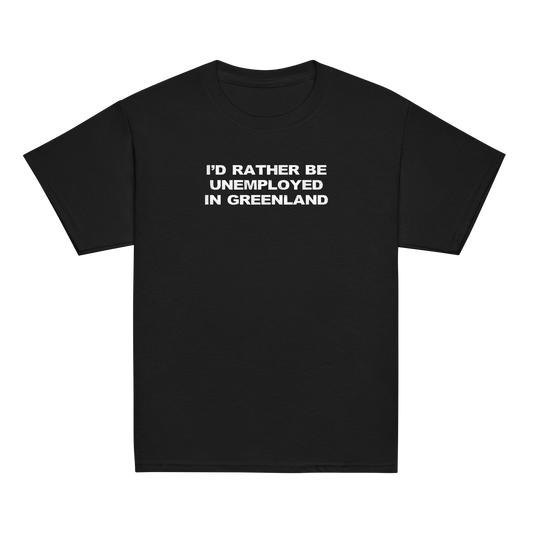 "I'd rather be unemployed in greenland" printed on a black youth classic tee laying on a flat surface