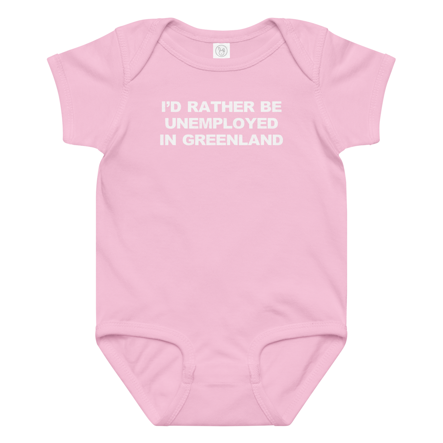 "I'd rather be unemployed in greenland" printed on a pink baby jersey bodysuit laying on a flat surface amongst other clothes
