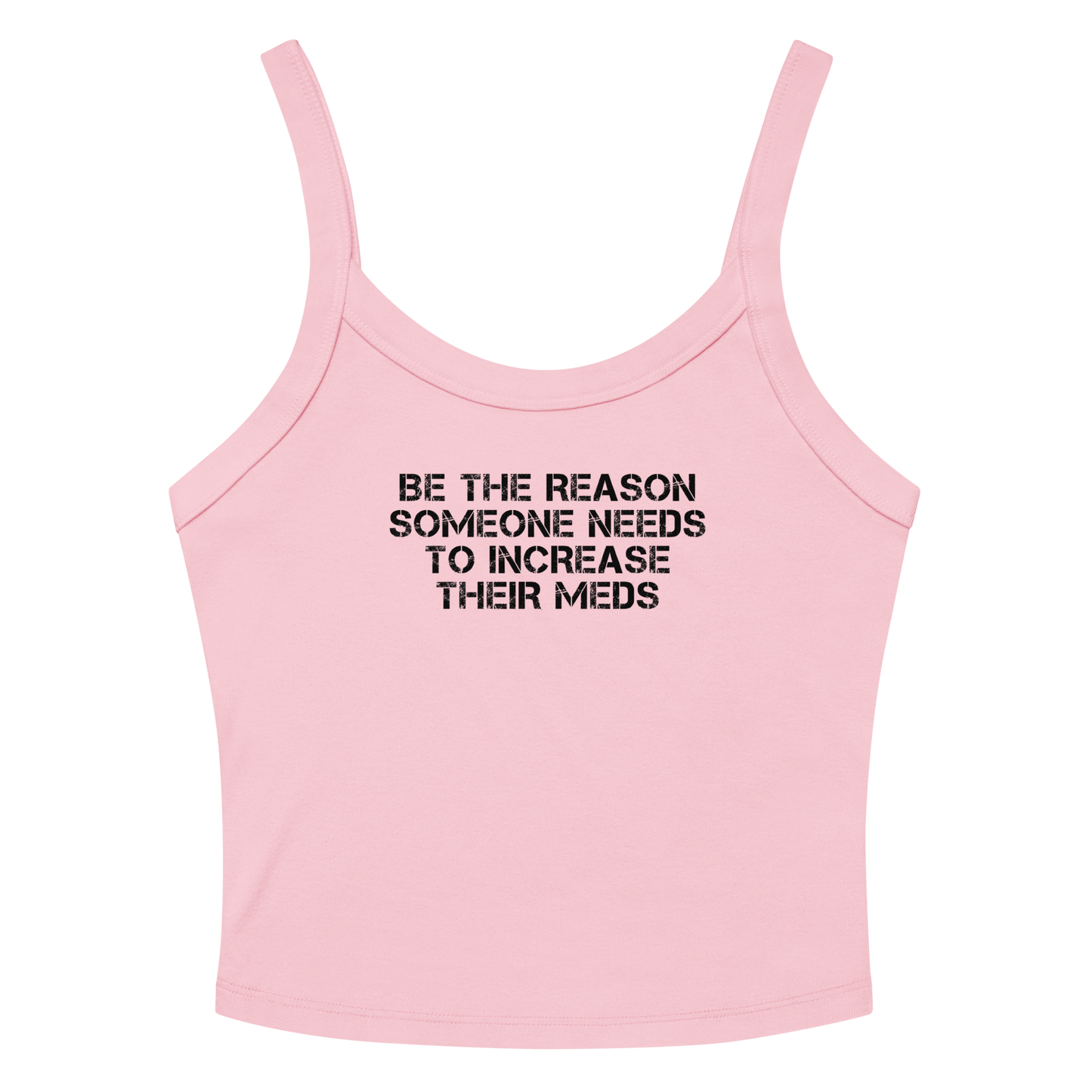 "Be the reason someone needs to increase their meds" printed on a solid pink blend women's micro-rib tanktop laying on a flat surface amongst sunglasses and shorts