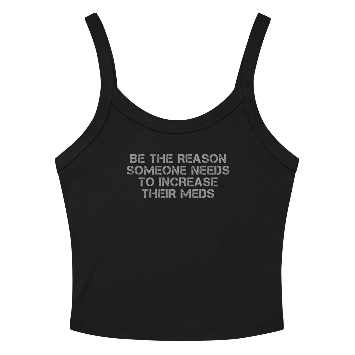 "Be the reason someone needs to increase their meds" printed on a solid black blend women's micro-rib tanktop laying on a flat surface amongst sunglasses and shorts
