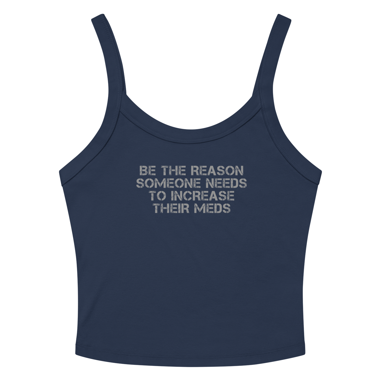 "Be the reason someone needs to increase their meds" printed on a solid navy blend women's micro-rib tanktop laying on a flat surface amongst sunglasses and shorts