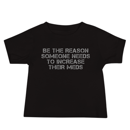 "Be the reason someone needs to increase their meds" printed on a black baby jersey short sleeve tee laying on a flat surface