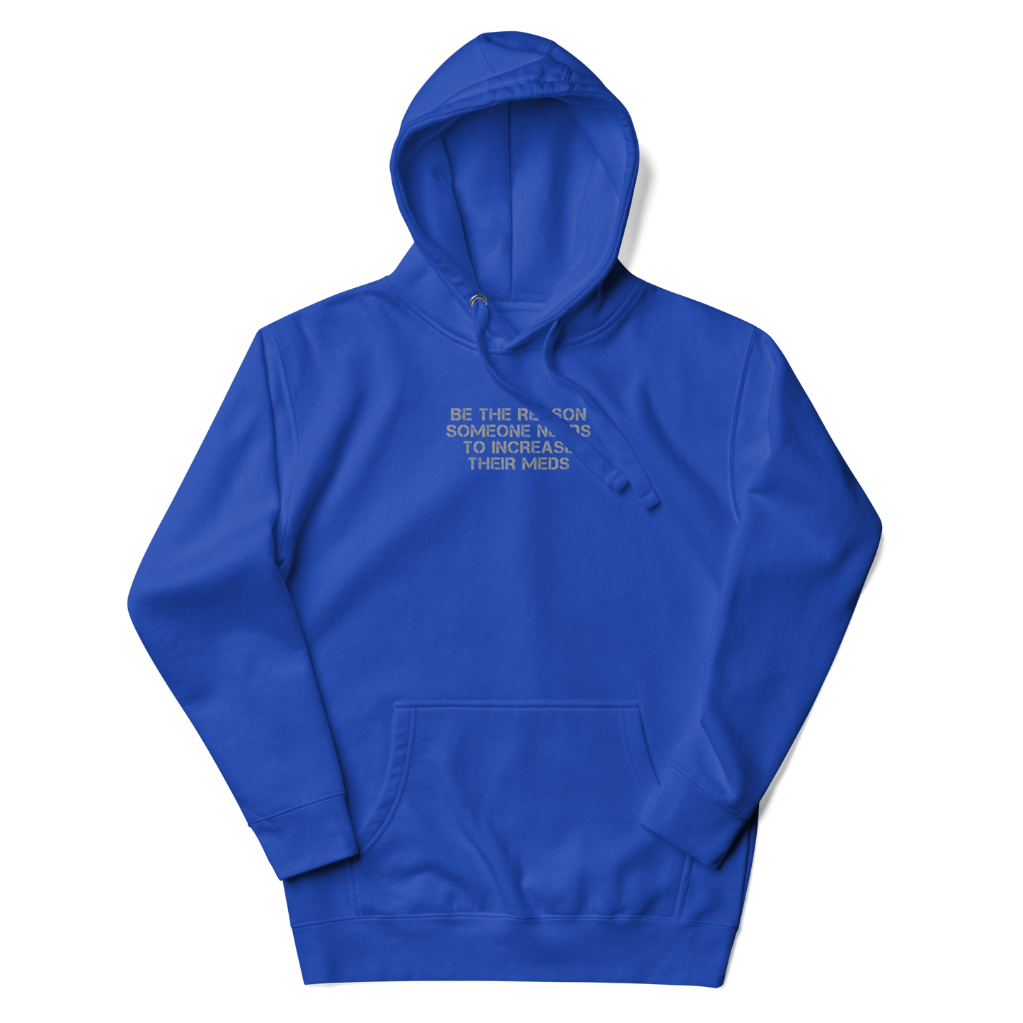"Be the reason someone needs to increase their meds" printed on a team royal unisex hoodie laying on a flat surface with the hood up