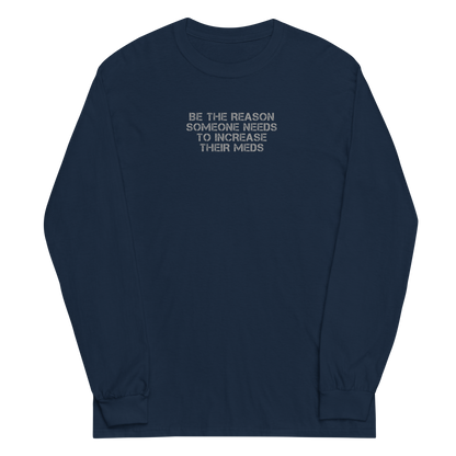 "Be the reason someone needs to increase their meds" printed on a navy men's long sleeve shirt laying on a flat surface