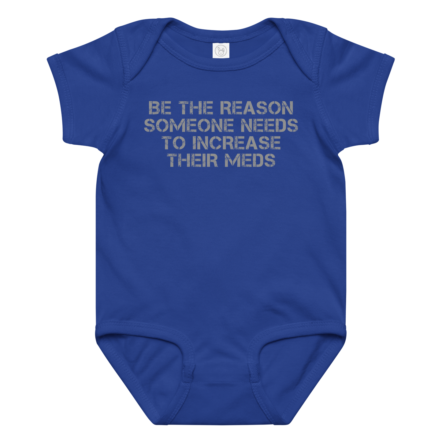 "Be the reason someone needs to increase their meds" printed on a royal baby jersey bodysuit laying on a flat surface amongst other clothes
