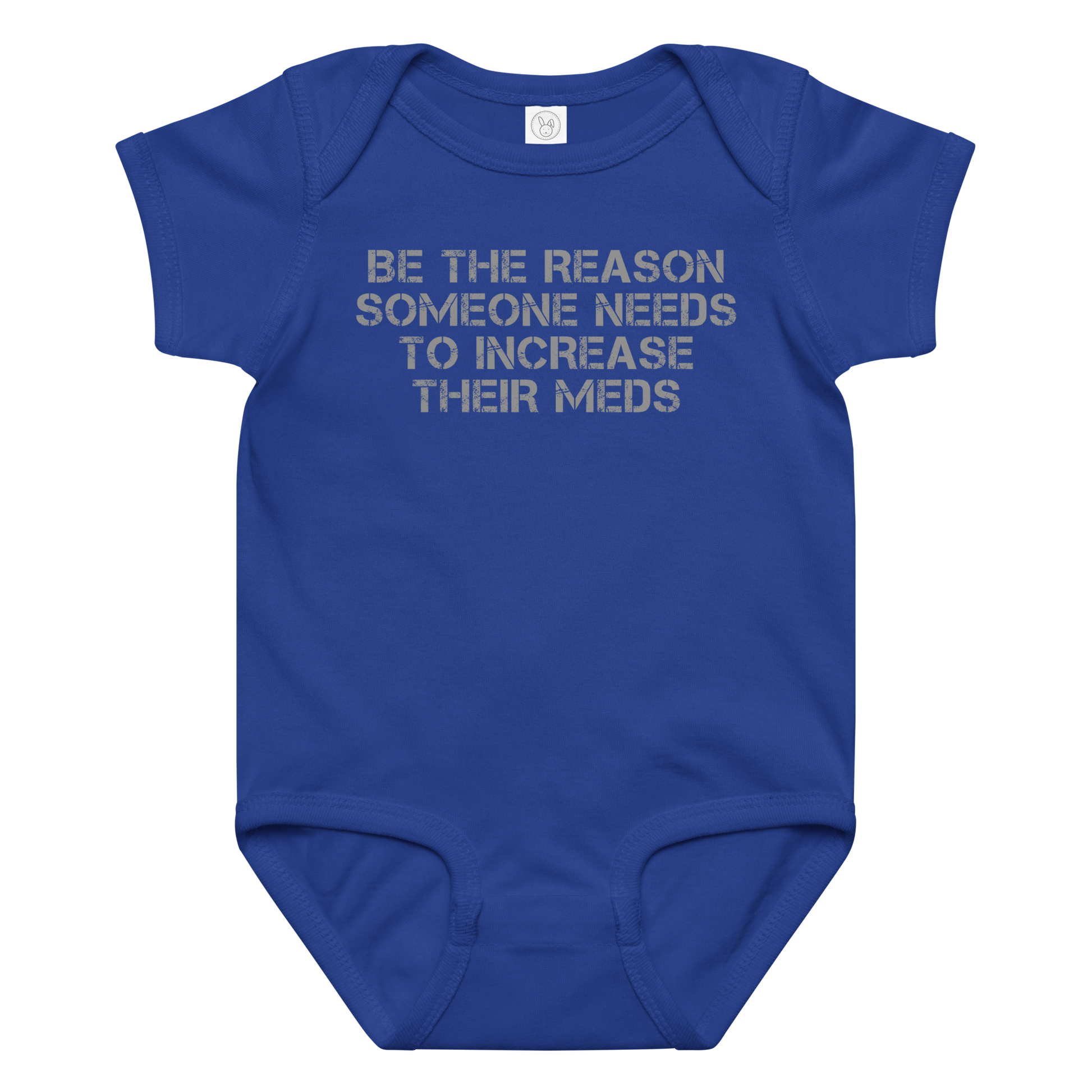 "Be the reason someone needs to increase their meds" printed on a royal baby jersey bodysuit laying on a flat surface amongst other clothes