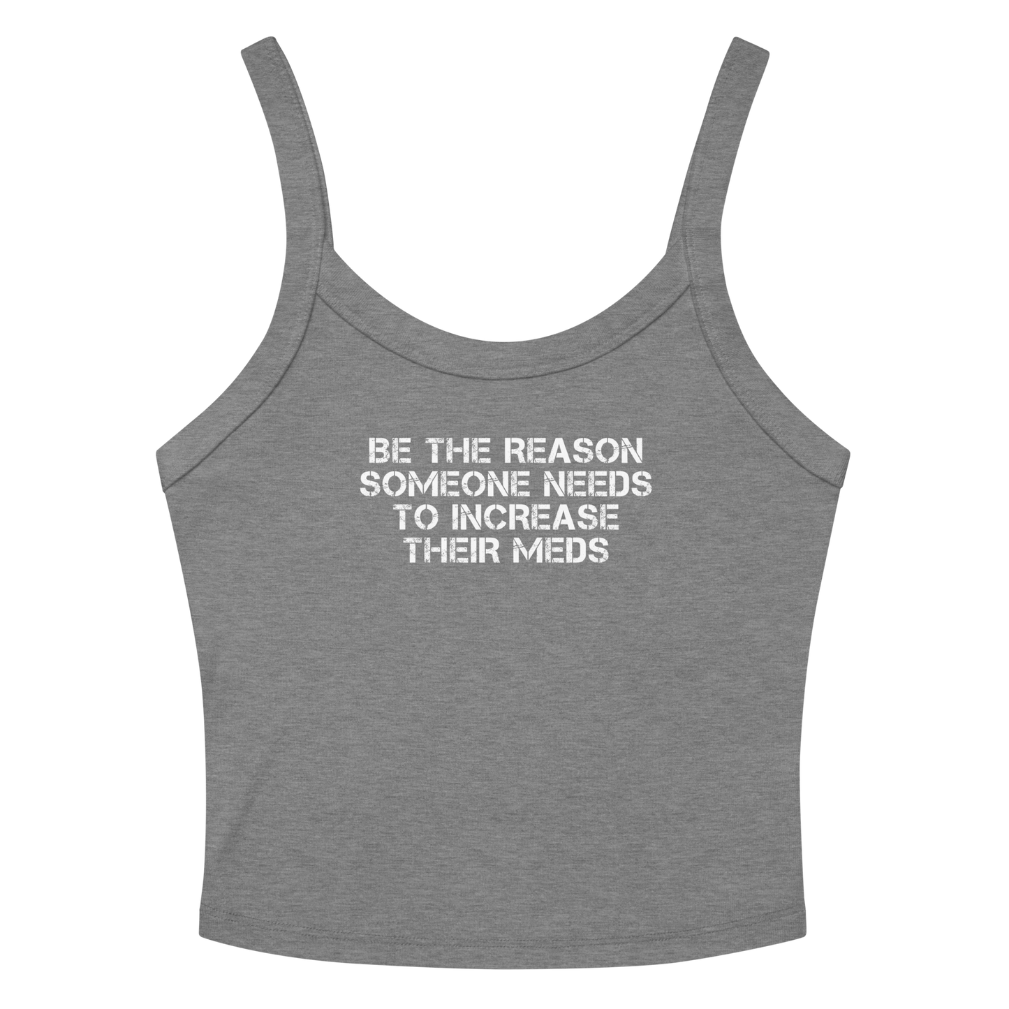 "Be the reason someone needs to increase their meds" printed on a athletic heather women's micro-rib tanktop laying on a flat surface amongst sunglasses and shorts