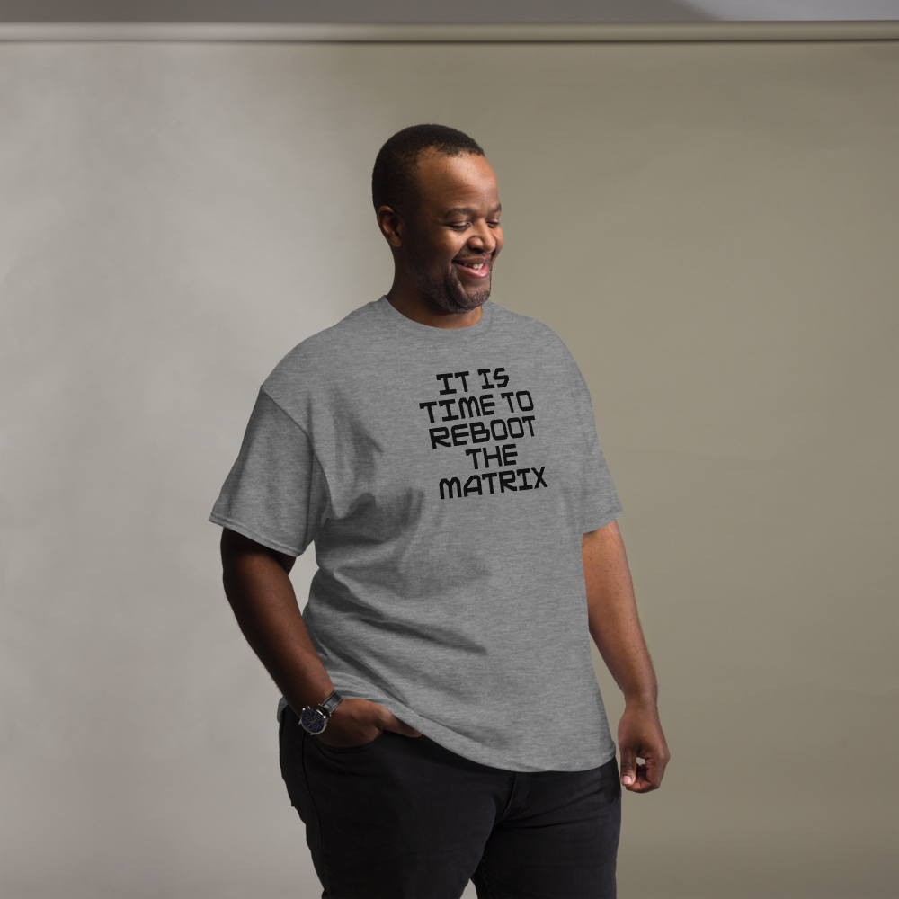 "It's time to reboot the matrix" printed on a graphite heather unisex classic tee worn by a male