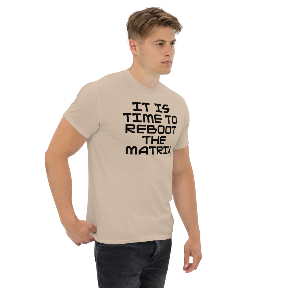 "It's time to reboot the matrix" printed on a sand unisex classic tee worn by a male