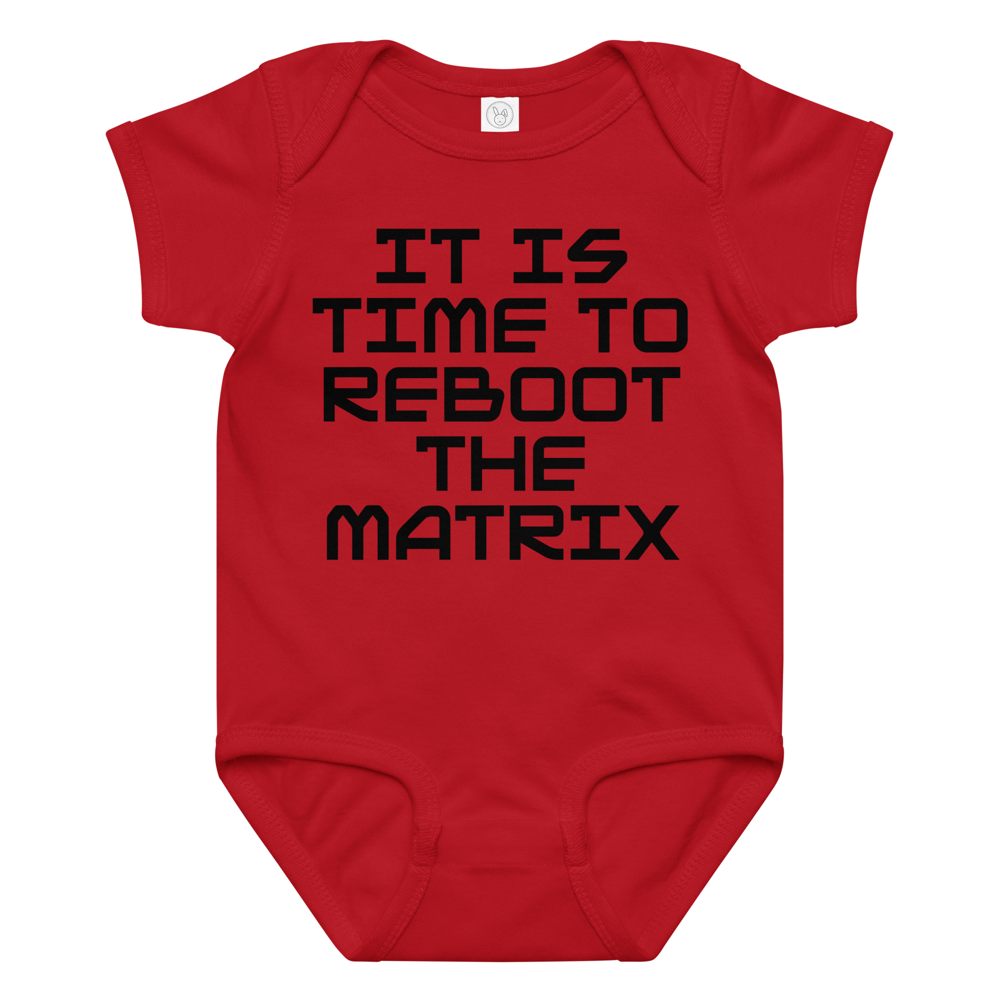 "It's time to reboot the matrix" printed on a red baby jersey bodysuit laying on a flat surface amongst other clothes