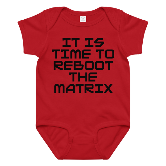 "It's time to reboot the matrix" printed on a red baby jersey bodysuit laying on a flat surface amongst other clothes
