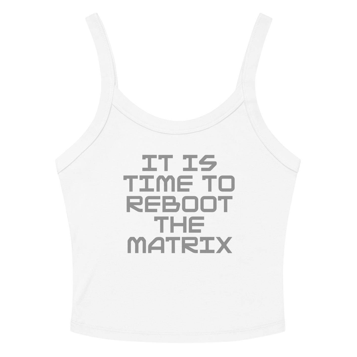 "It's time to reboot the matrix" printed on a solid white blend women's micro-rib tanktop laying on a flat surface amongst sunglasses and shorts