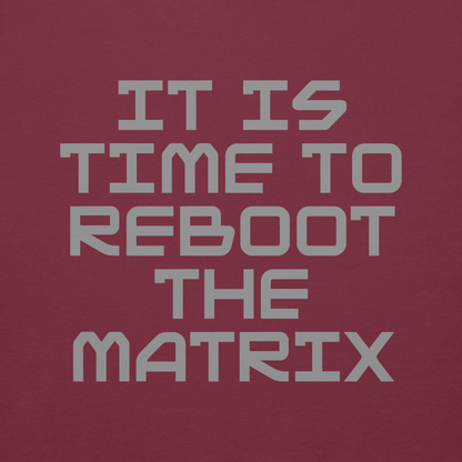"It's time to reboot the matrix" printed on a maroon background