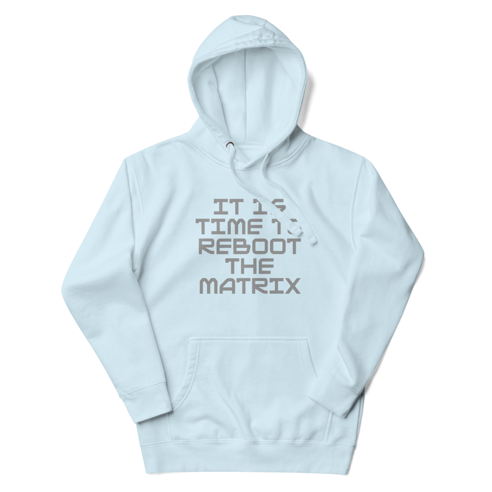 "It's time to reboot the matrix" printed on a sky blue unisex hoodie laying on a flat surface with the hood up
