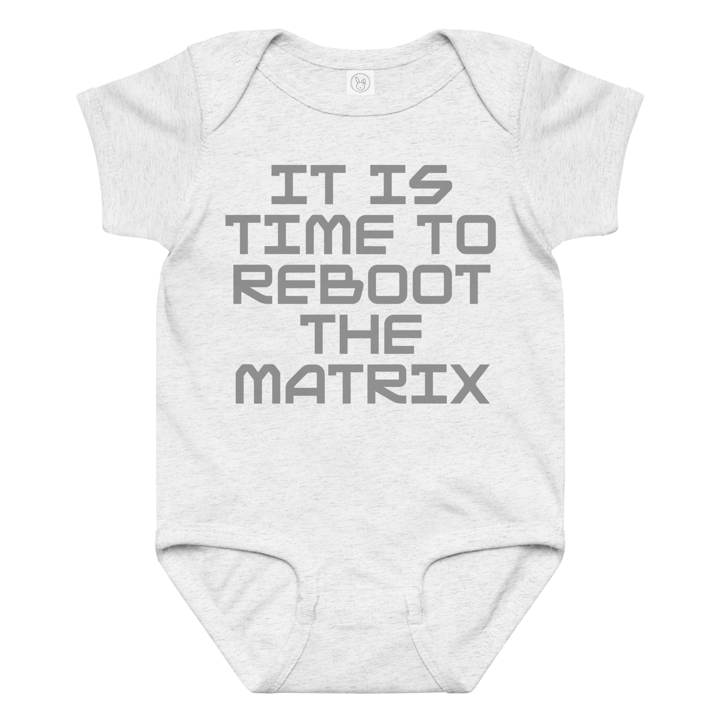 "It's time to reboot the matrix" printed on a ash baby jersey bodysuit laying on a flat surface amongst other clothes