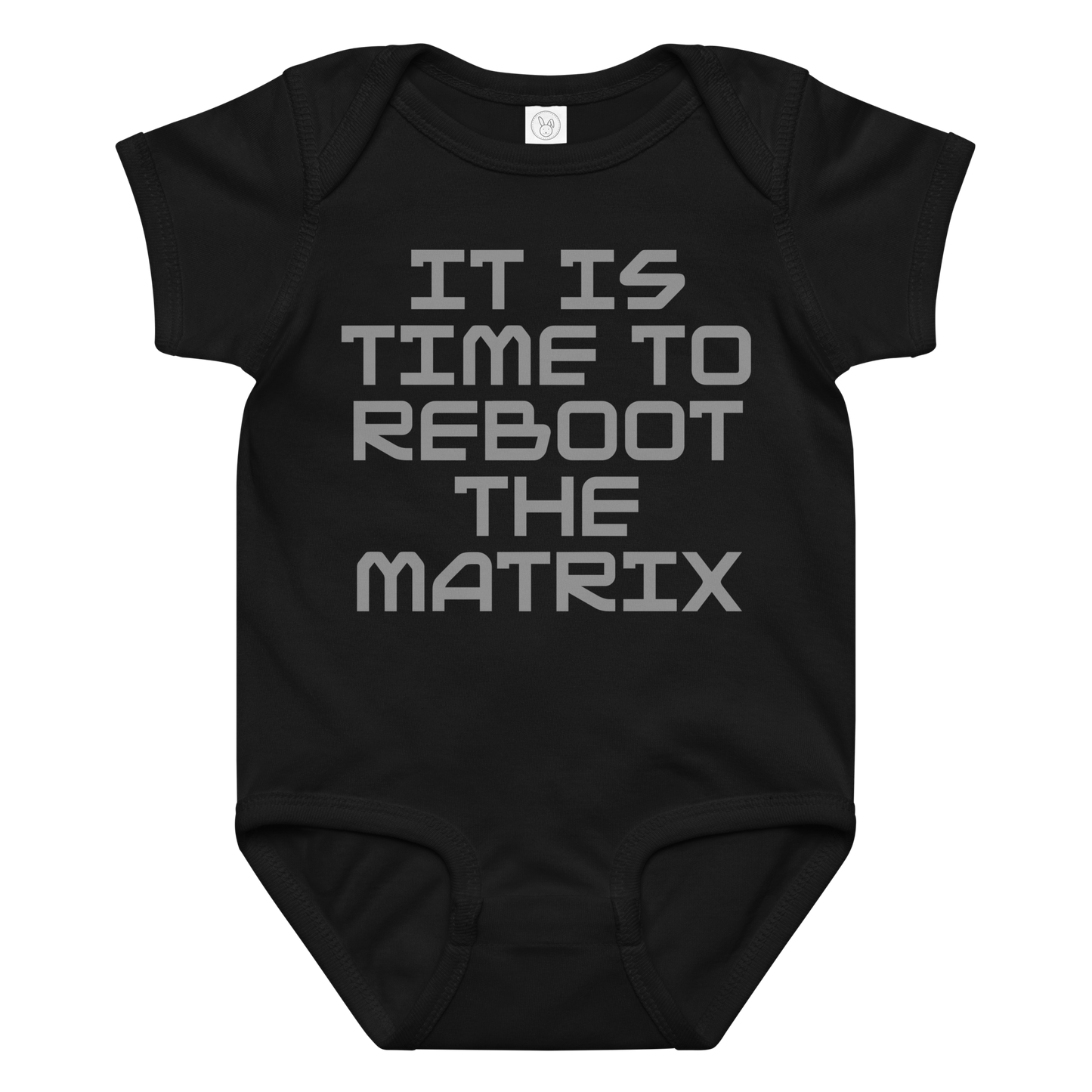 "It's time to reboot the matrix" printed on a black baby jersey bodysuit laying on a flat surface amongst other clothes