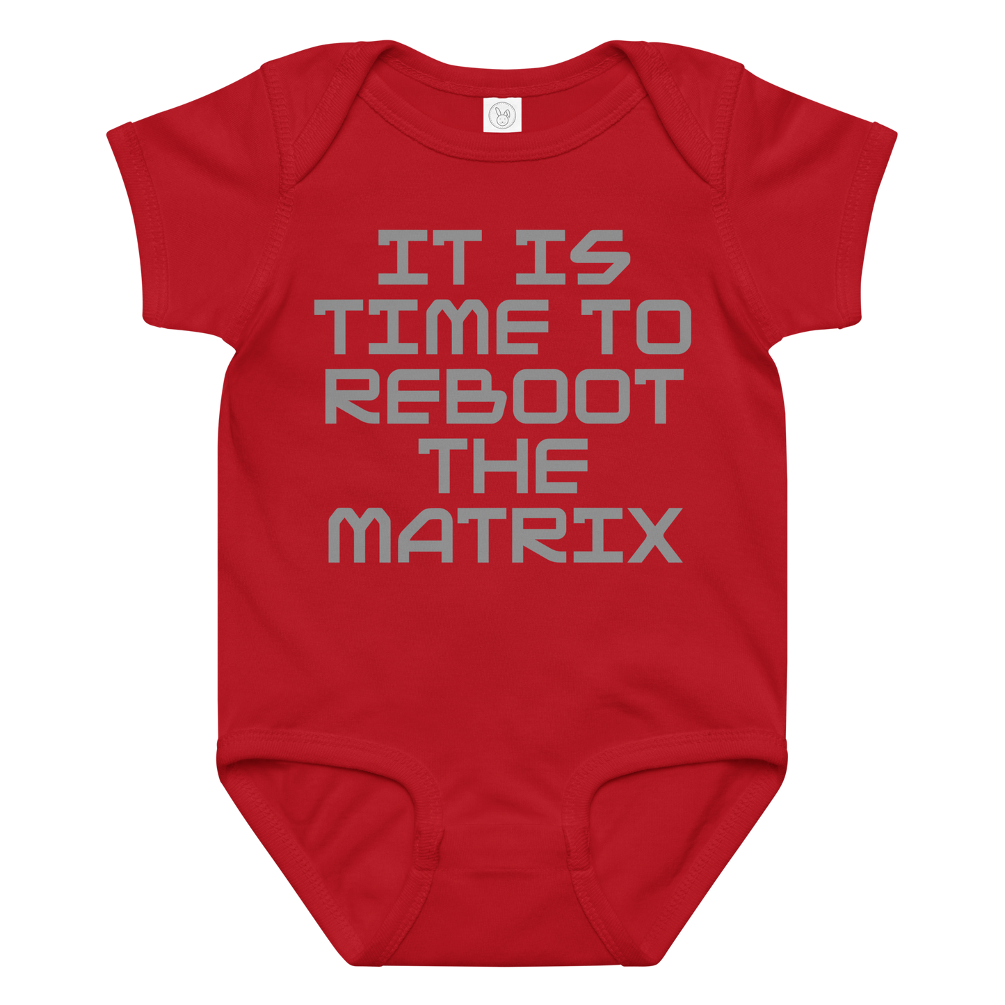 "It's time to reboot the matrix" printed on a red baby jersey bodysuit laying on a flat surface amongst other clothes