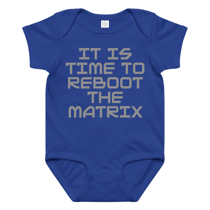 "It's time to reboot the matrix" printed on a royal baby jersey bodysuit laying on a flat surface amongst other clothes