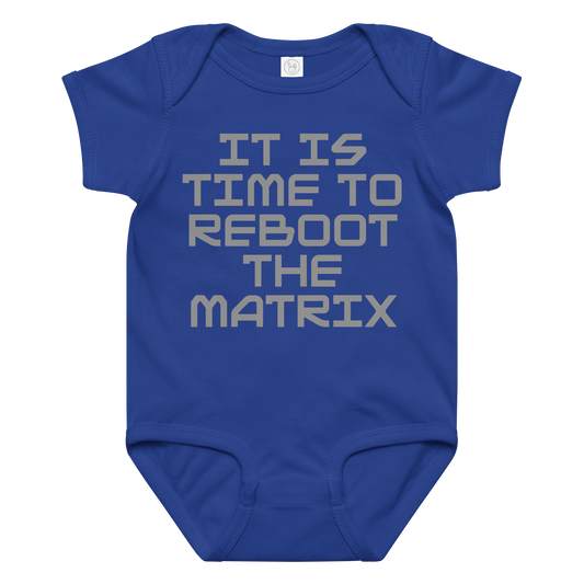 "It's time to reboot the matrix" printed on a royal baby jersey bodysuit laying on a flat surface amongst other clothes