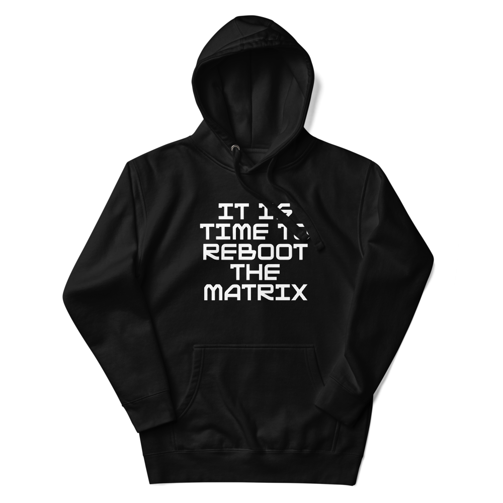 "It's time to reboot the matrix" printed on a black unisex hoodie laying on a flat surface with the hood up