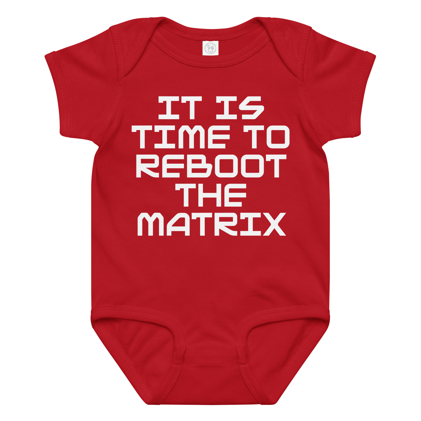 "It's time to reboot the matrix" printed on a red baby jersey bodysuit laying on a flat surface amongst other clothes