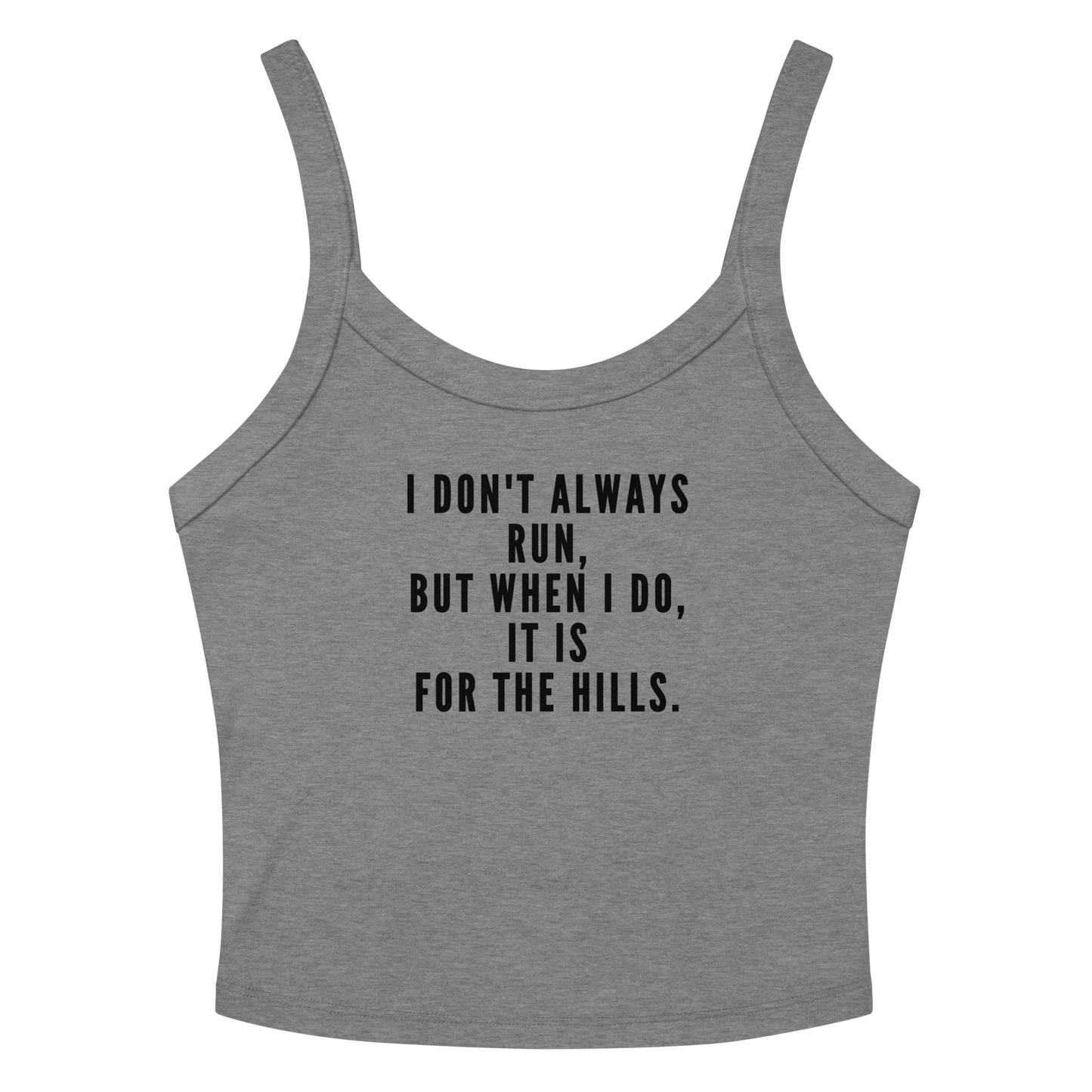 "I don't always run, but when I do, it is for the hills." printed on a athletic heather women's micro-rib tanktop laying on a flat surface amongst sunglasses and shorts