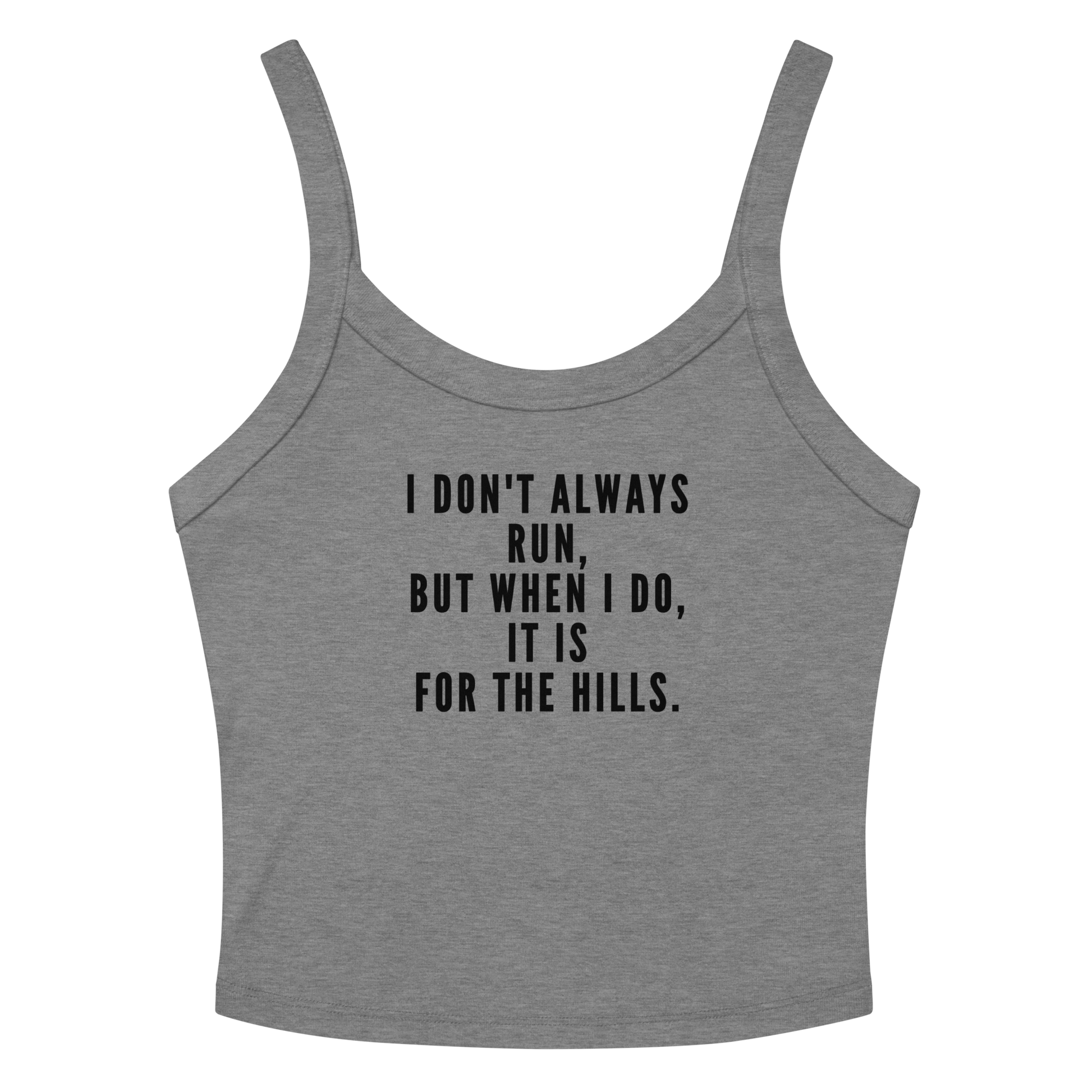 "I don't always run, but when I do, it is for the hills." printed on a athletic heather women's micro-rib tanktop laying on a flat surface amongst sunglasses and shorts