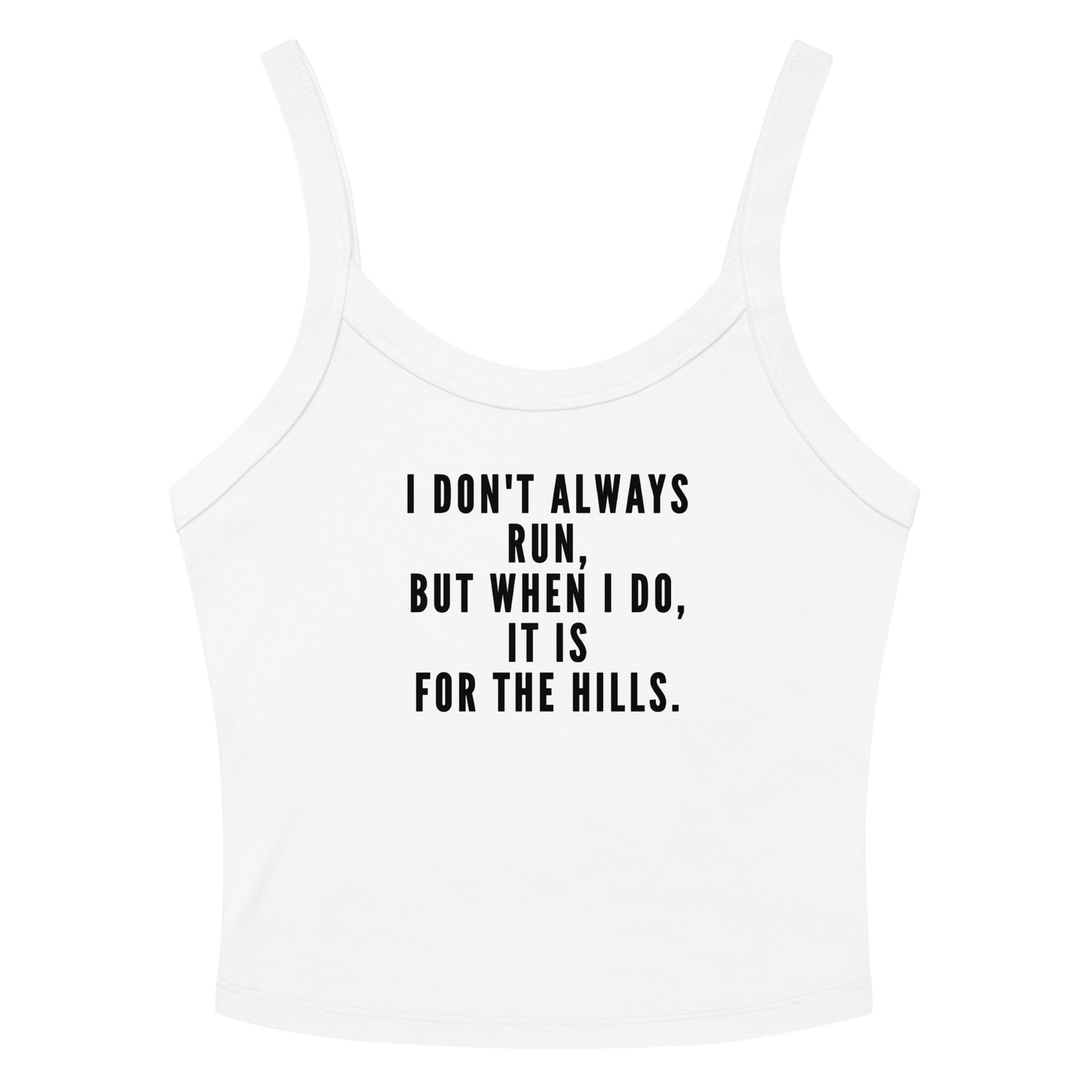"I don't always run, but when I do, it is for the hills." printed on a solid white blend women's micro-rib tanktop laying on a flat surface amongst sunglasses and shorts