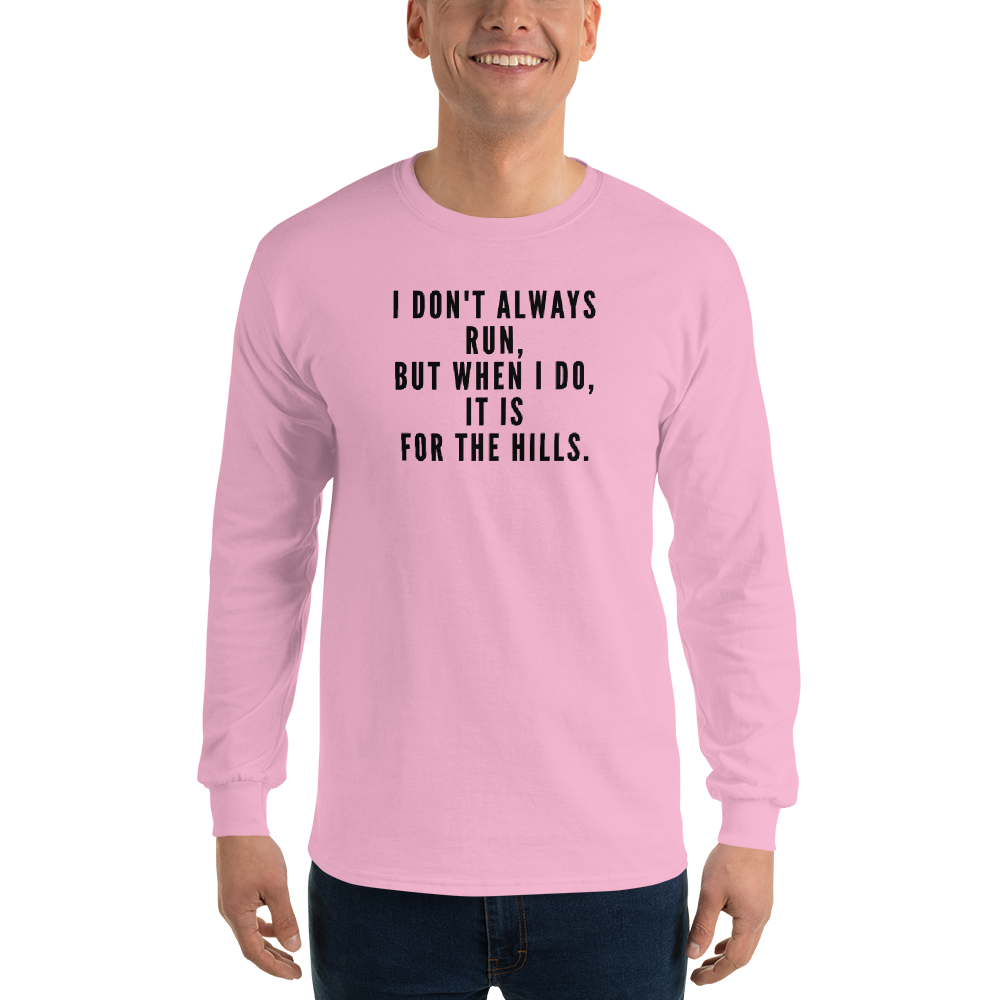 "I don't always run, but when I do, it is for the hills." printed on a light pink men's long sleeve shirt worn by a male