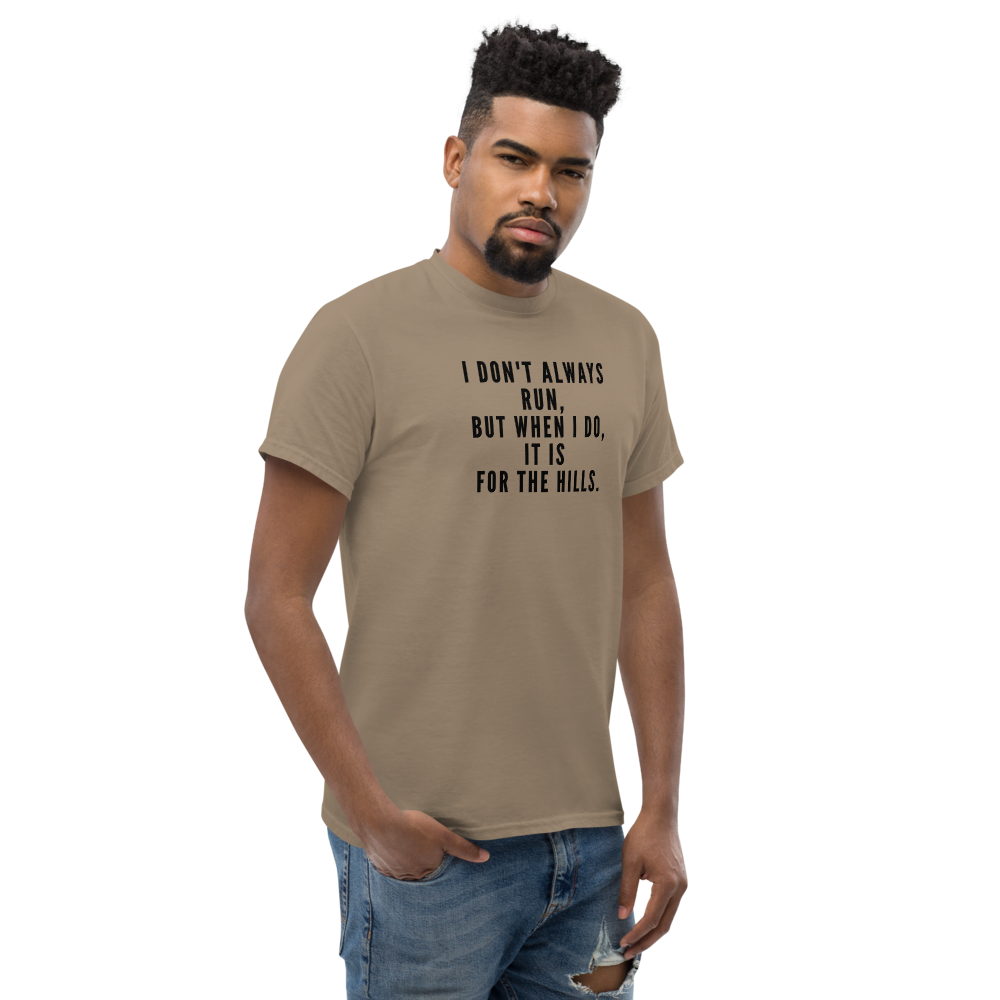 "I don't always run, but when I do, it is for the hills." printed on a brown savana unisex classic tee worn by a male