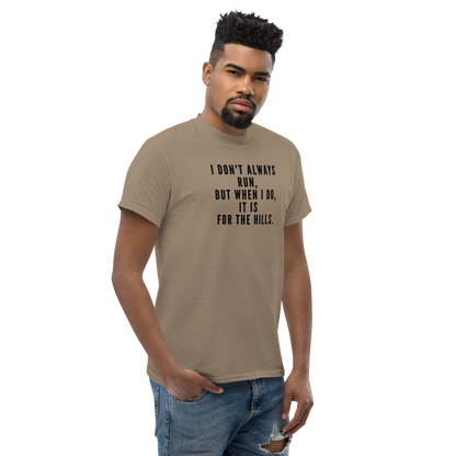 "I don't always run, but when I do, it is for the hills." printed on a brown savana unisex classic tee worn by a male