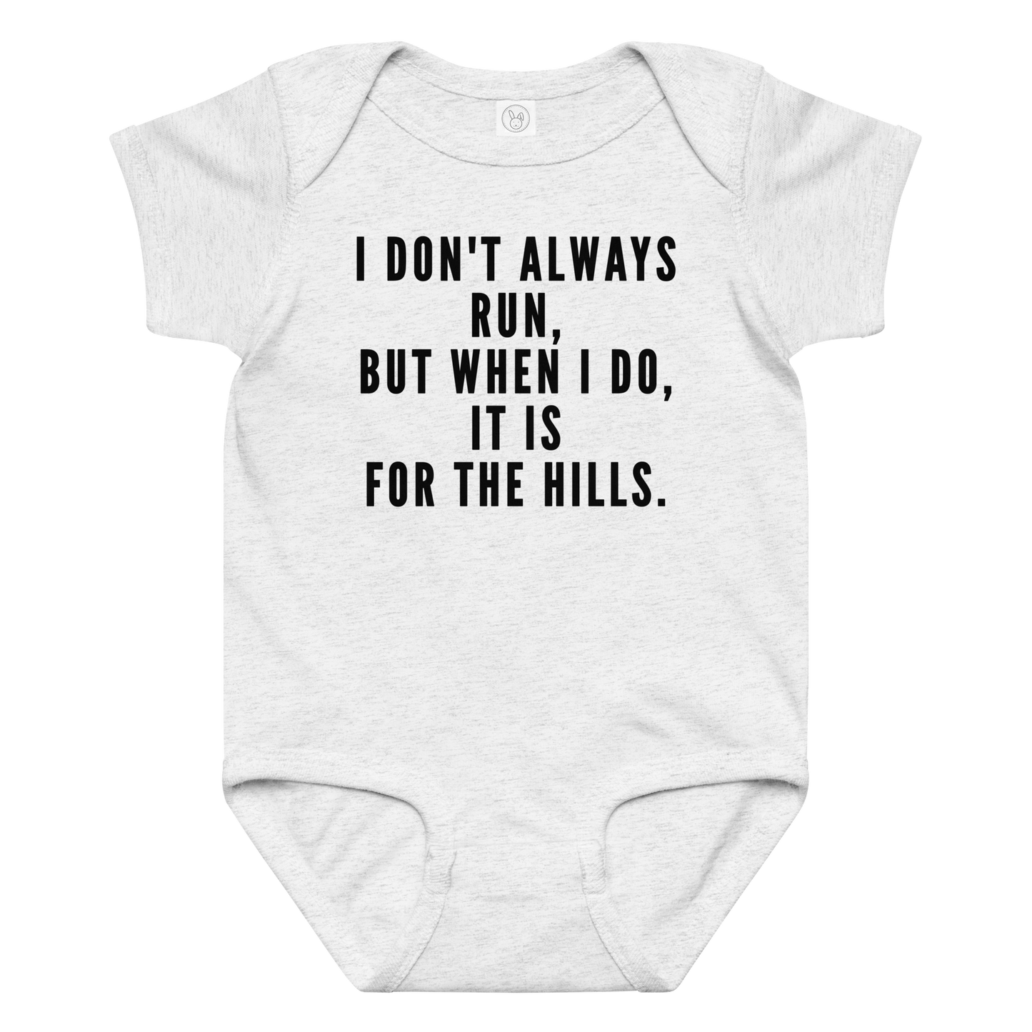 "I don't always run, but when I do, it is for the hills." printed on a ash baby jersey bodysuit laying on a flat surface amongst other clothes