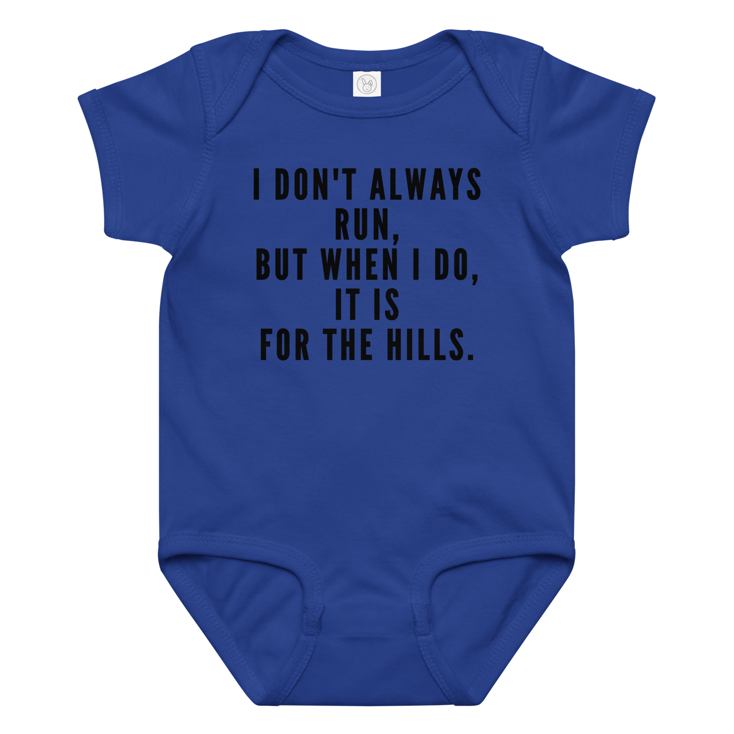 "I don't always run, but when I do, it is for the hills." printed on a royal baby jersey bodysuit laying on a flat surface amongst other clothes