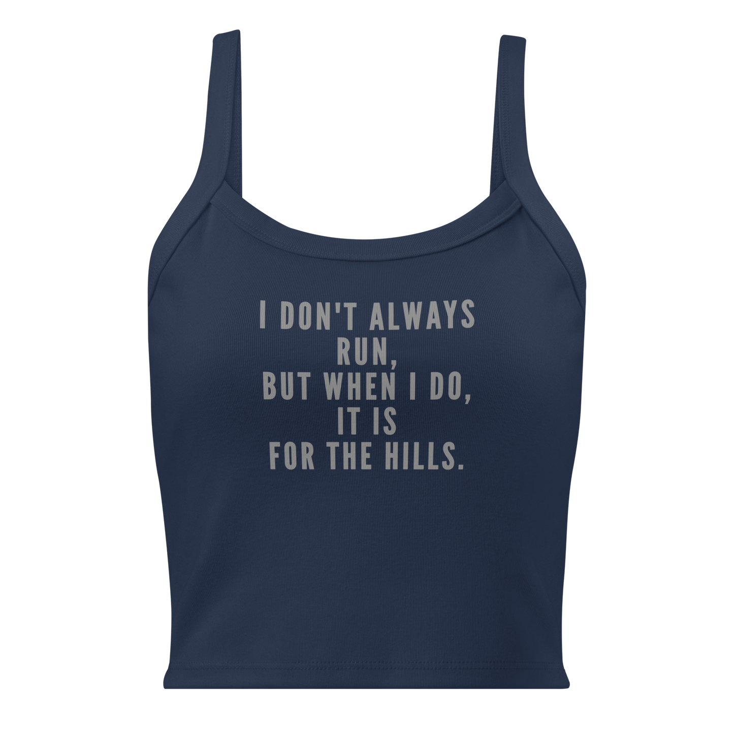 "I don't always run, but when I do, it is for the hills." printed on a solid navy blend women's micro-rib tanktop laying on a flat surface