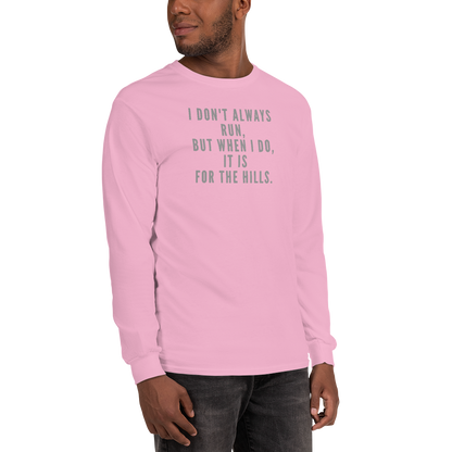"I don't always run, but when I do, it is for the hills." printed on a light pink men's long sleeve shirt worn by a male