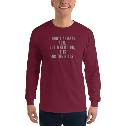 "I don't always run, but when I do, it is for the hills." printed on a maroon men's long sleeve shirt worn by a male