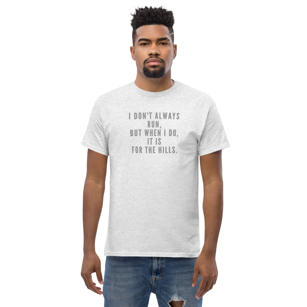 "I don't always run, but when I do, it is for the hills." printed on a ash unisex classic tee worn by a male