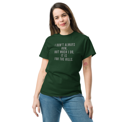 "I don't always run, but when I do, it is for the hills." printed on a forest green unisex classic tee worn by a female
