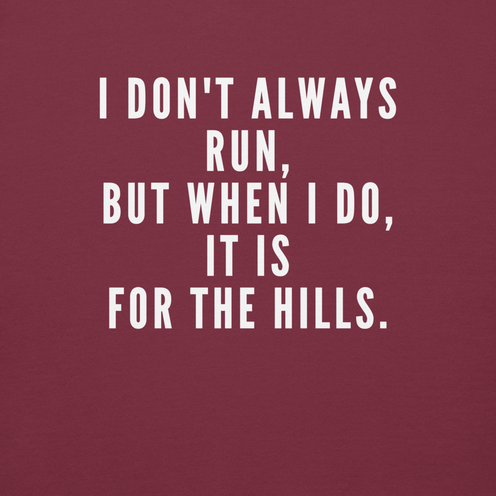 "I don't always run, but when I do, it is for the hills." printed on a maroon background