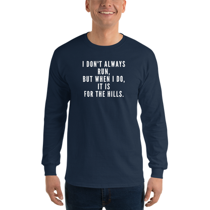"I don't always run, but when I do, it is for the hills." printed on a navy men's long sleeve shirt worn by a male