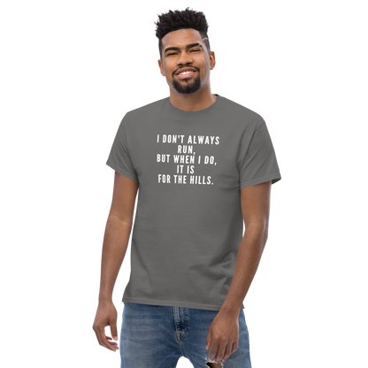 "I don't always run, but when I do, it is for the hills." printed on a charcoal unisex classic tee worn by a male