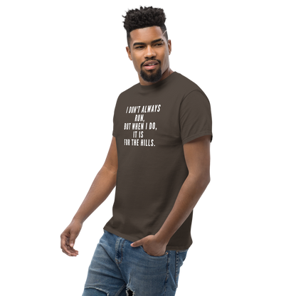 "I don't always run, but when I do, it is for the hills." printed on a dark chocolate unisex classic tee worn by a male