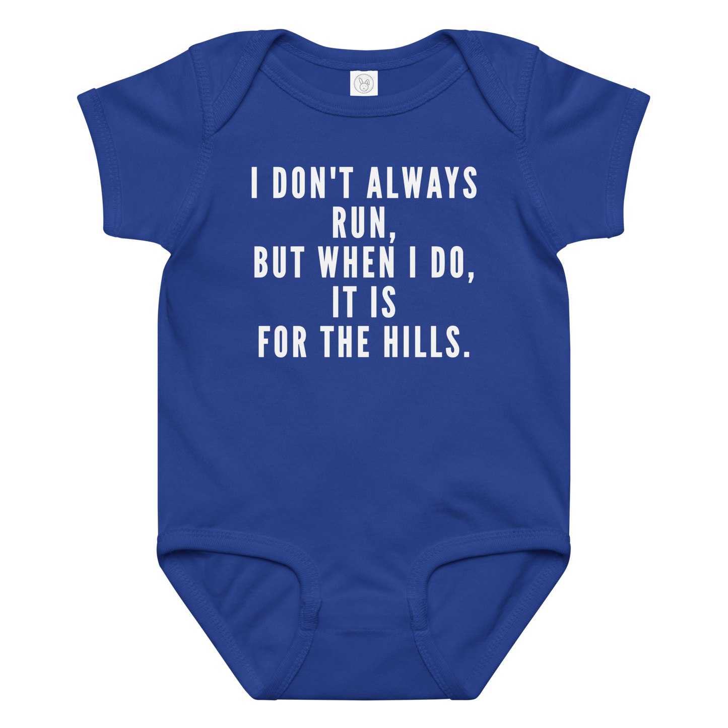 "I don't always run, but when I do, it is for the hills." printed on a royal baby jersey bodysuit laying on a flat surface amongst other clothes