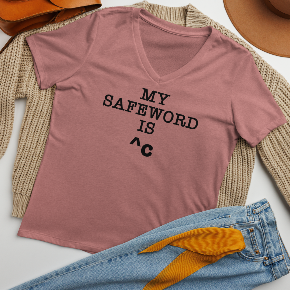 "My Safe Word Is ^C" printed on a heather mauve women's relaxed v-neck t-shirt laying on a flat surface amongst other clothes