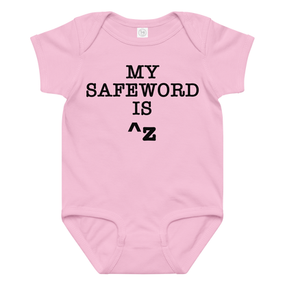 "My Safe Word Is ^Z" printed on a pink baby jersey bodysuit laying on a flat surface amongst other clothes