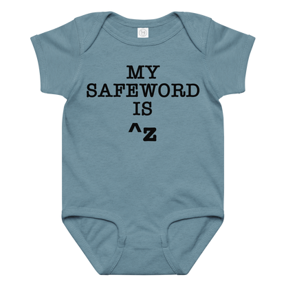 "My Safe Word Is ^Z" printed on a vintage indigo baby jersey bodysuit laying on a flat surface amongst other clothes