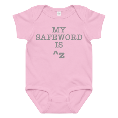 "My Safe Word Is ^Z" printed on a pink baby jersey bodysuit laying on a flat surface amongst other clothes