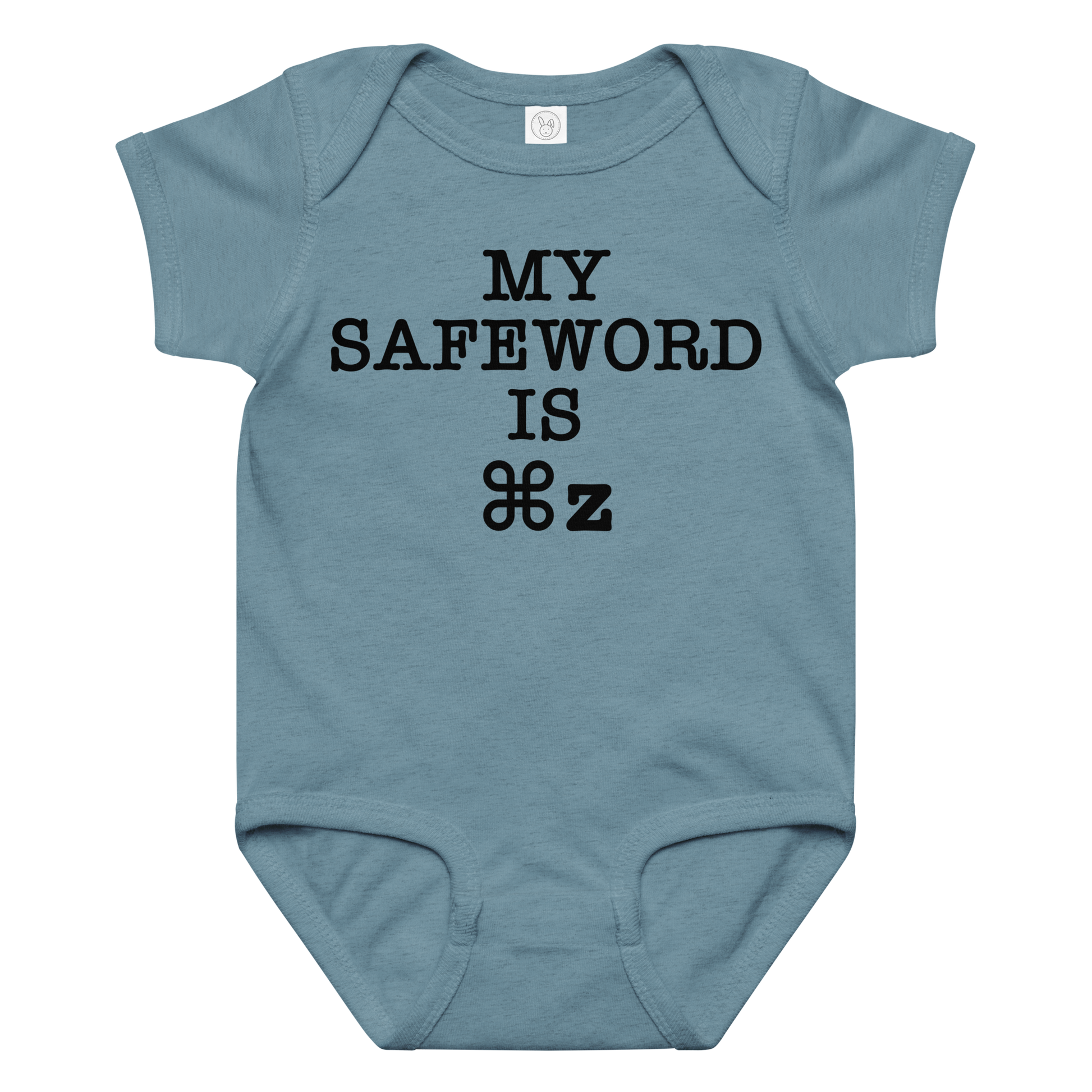 "My Safe Word Is ⌘Z" printed on a vintage indigo baby jersey bodysuit laying on a flat surface amongst other clothes