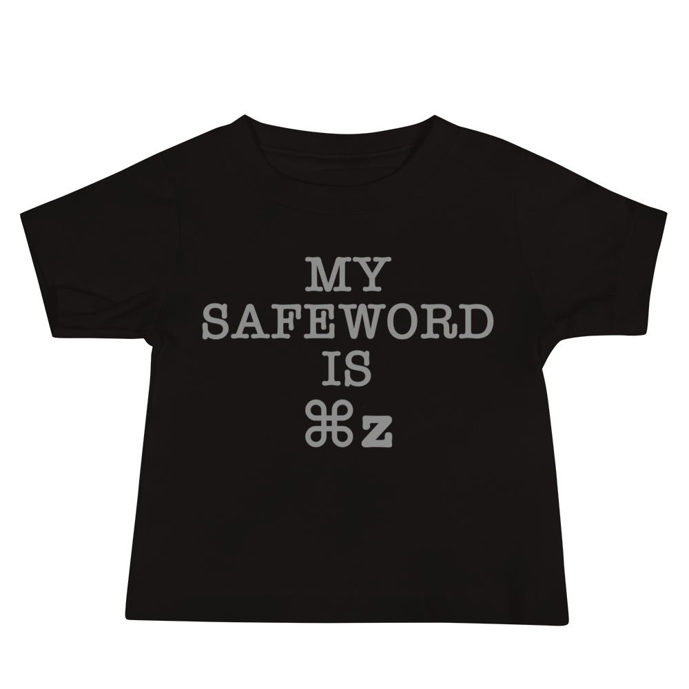 "My Safe Word Is ⌘Z" printed on a black baby jersey short sleeve tee laying on a flat surface